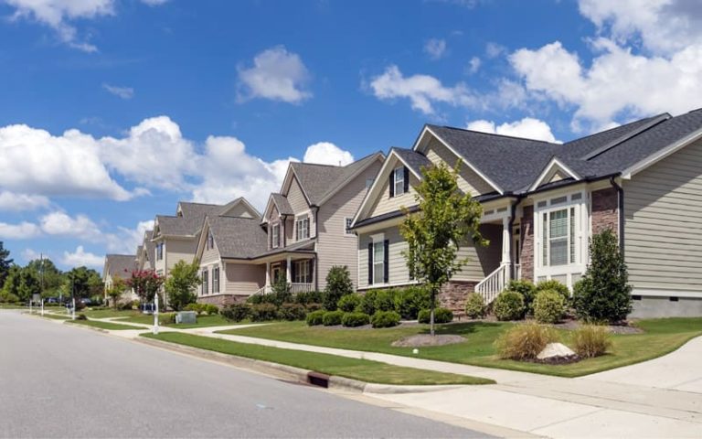 Row of homes on a suburban road