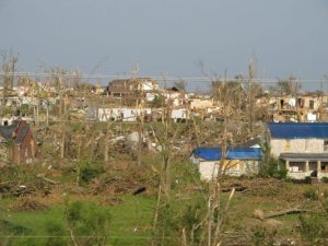 broken trees and debris after a tornado